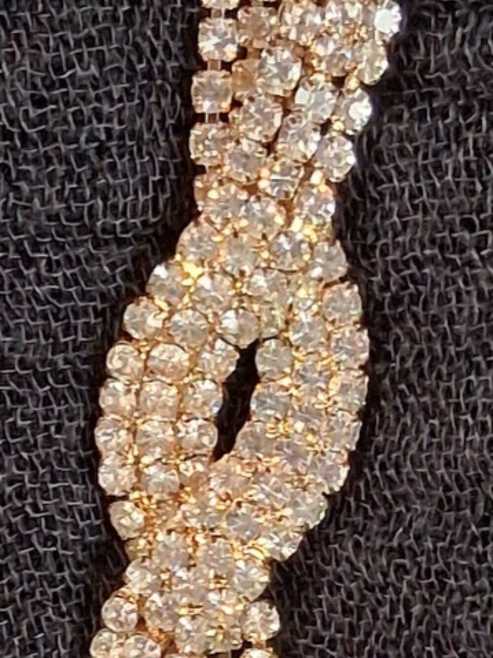 Gold-Tone Rhinestone Tassel Infinity Knot Necklace - Picture 4 of 11